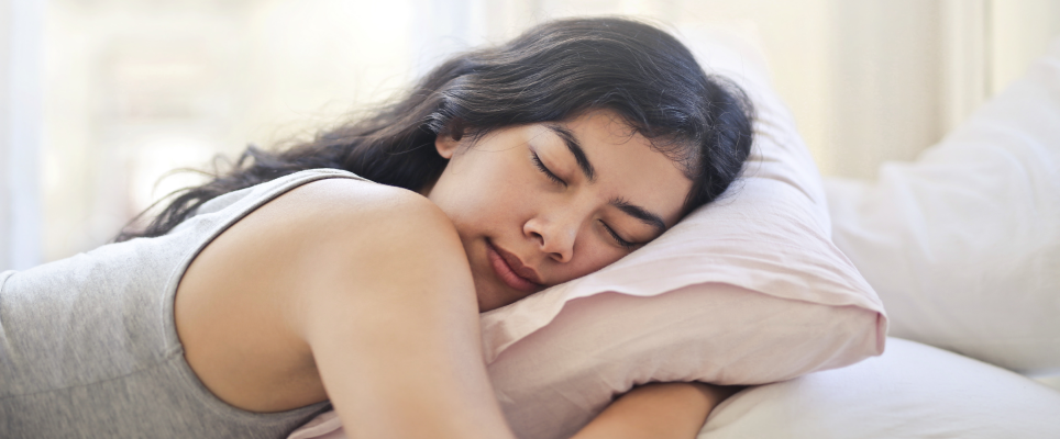 woman laying in bed sleeping